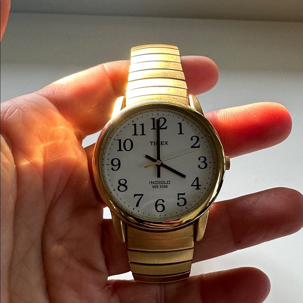 Timex Gold-Tone Watch with White Face